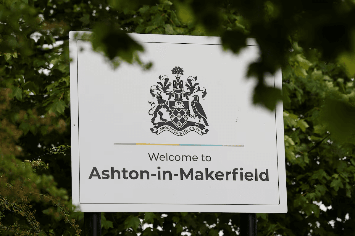 A roadside 'Welcome to Ashton-in-Makerfield' town sign, the constituency holding the 2026 by-election